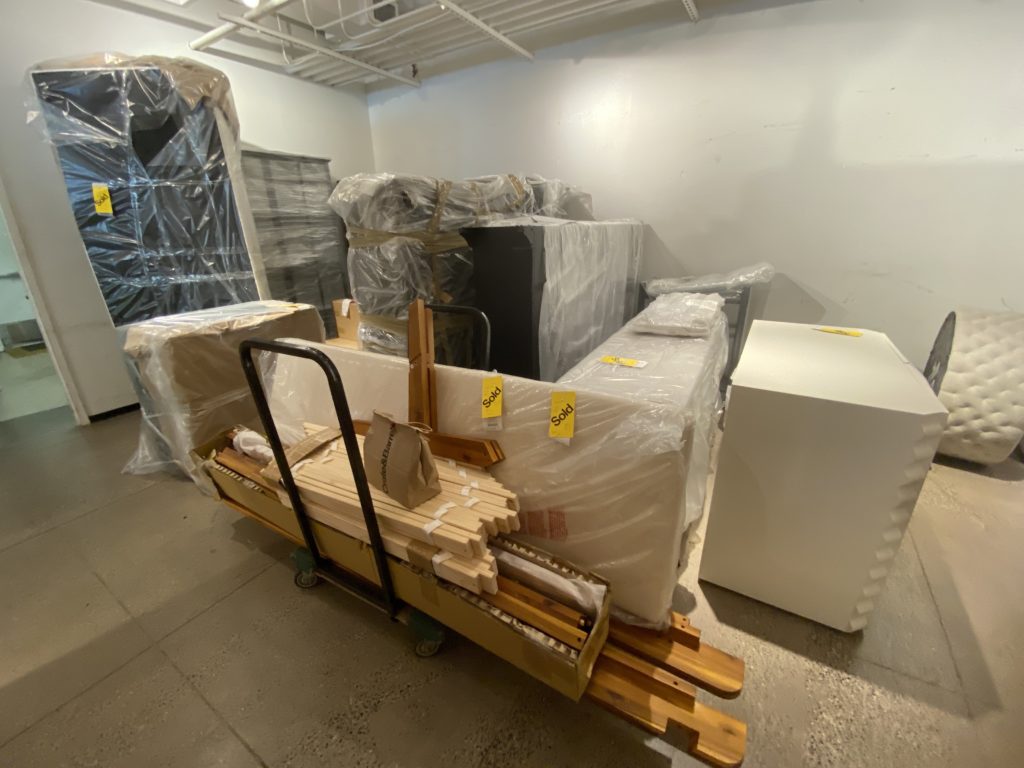 Crate & Barrel Outlet Sold Items Wrapped Up For Delivery